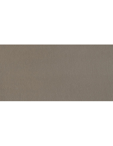 Vzorek mikrocementové betonové stěrky v odstínu Sand Stone (tlumená pískově šedá)